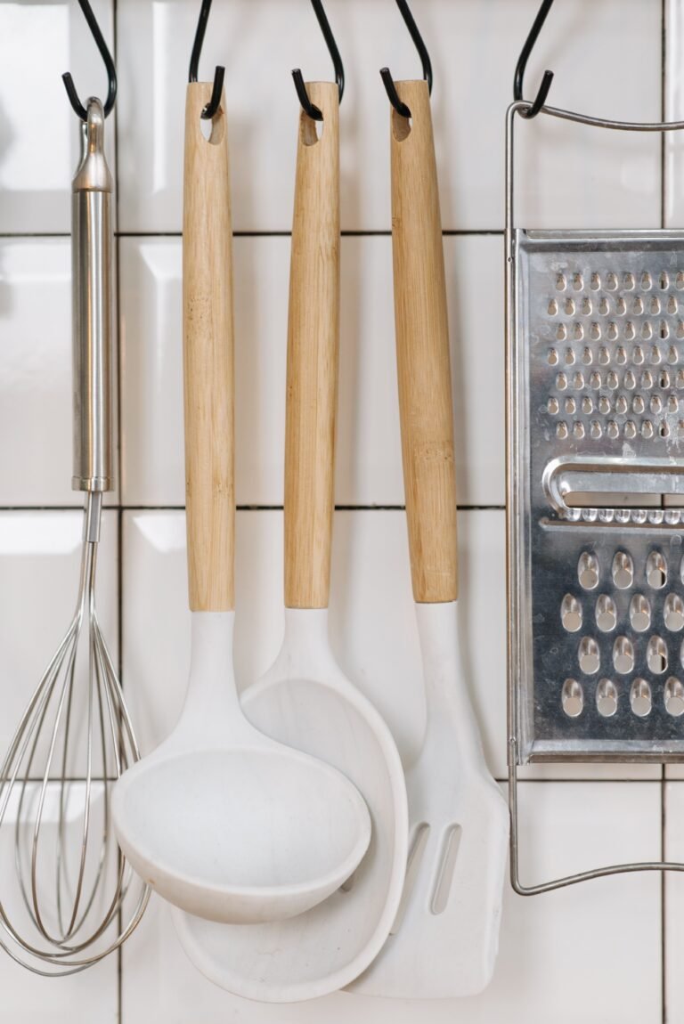 Silicone kitchen utensils on a counter, exploring whether is silicone safe for cooking.