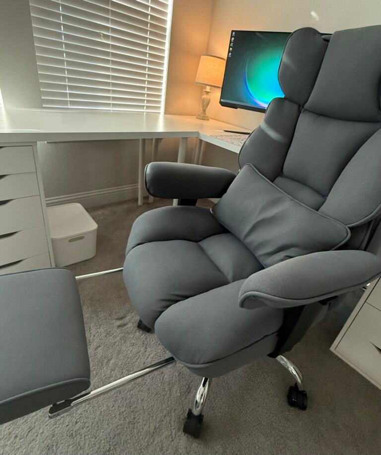 Efomao fabric office chair with a footrest next to white desk